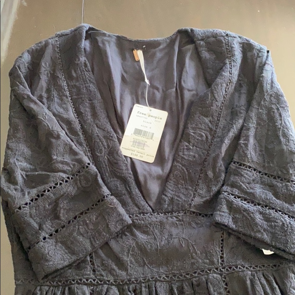 Beautiful black lace dress by Free People.